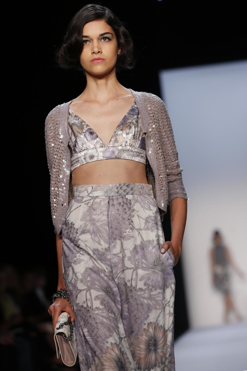 The Badgley Mischka Spring 2014 collection is modeled during Fashion Week in New York, Tuesday, Sept. 10, 2013. (AP Photo/John Minchillo)