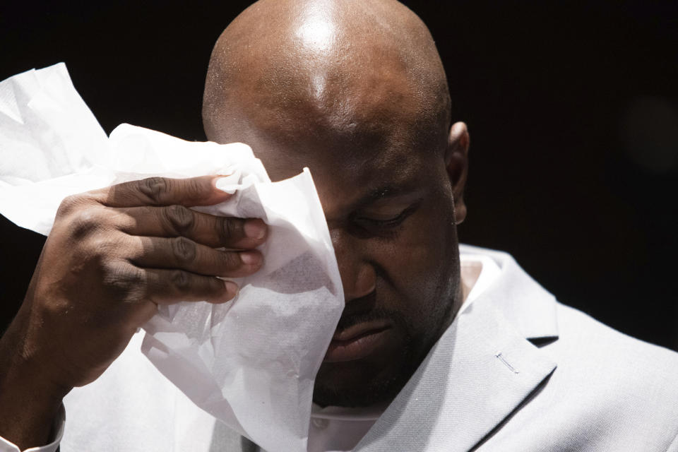 Philonise Floyd, a brother of George Floyd, reacts as he describes the pain of losing his brother as he testifies during a House Judiciary Committee hearing on proposed changes to police practices and accountability on Capitol Hill, Wednesday, June 10, 2020, in Washington. (Graeme Jennings/Pool via AP)