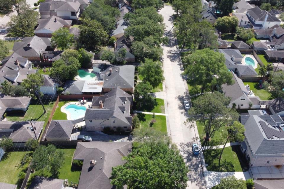 An aerial view of houses in a residential neighborhood of Houston, Texas. Christopher Sadowski