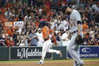 Jul 13, 2018; Houston, TX, USA; Detroit Tigers starting pitcher Mike Fiers (50) reacts and Houston Astros third baseman Alex Bregman (2) rounds the bases after hitting a home run during the first inning at Minute Maid Park. Mandatory Credit: Troy Taormina-USA TODAY Sports