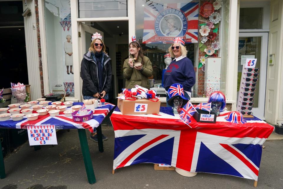 Shop owners join in with the fun during the Bishopthorpe Road Street Party celebrating the Queen’s platinum jubilee on 5 June 2022 in York (Getty Images)