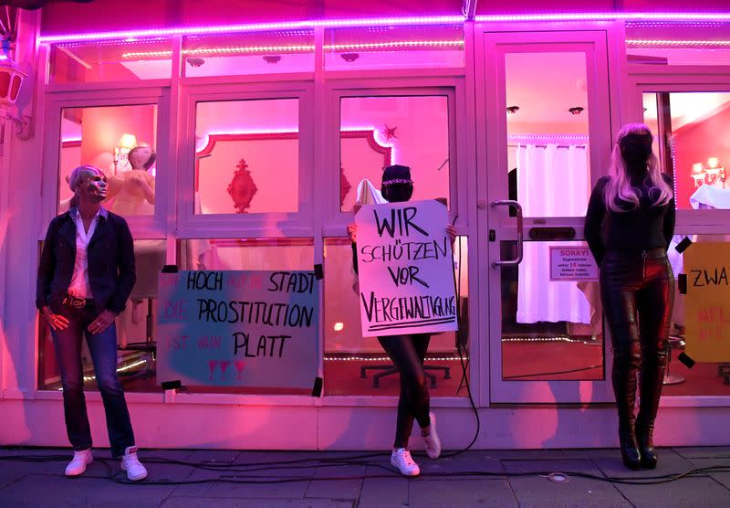 Prostitutes hold a rally in Hamburg demanding the reopening of Germany's brothels