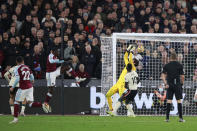 West Ham's Kurt Zouma, second from right, scores his side's 3rd goal during the English Premier League soccer match between West Ham United and Liverpool at the London stadium in London, England, Sunday, Nov. 7, 2021. (AP Photo/Ian Walton)