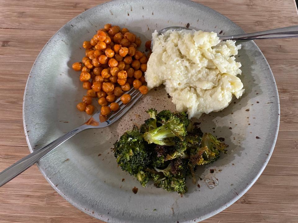 plate of dinner with broccoli, chickpeas, and mashed potatoes