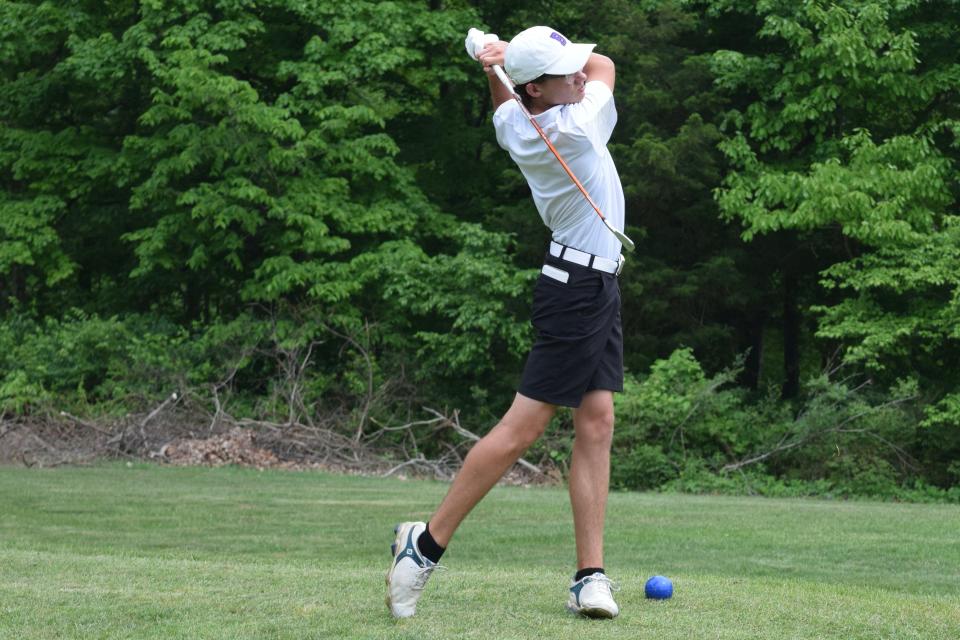 Bloomington South sophomore Landon "Happy" Gilmore tees off on the first hole at Cascades Golf Course during the Panthers' dual match against Bloomington North. The match was later suspended due to inclement weather. (Seth Tow/Herald-Times)