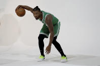 Boston Celtics guard Marcus Smart dribbles the ball for a photo shoot during the Boston Celtics Media Day, Monday, Sept. 27, 2021, in Canton, Mass. (AP Photo/Mary Schwalm)