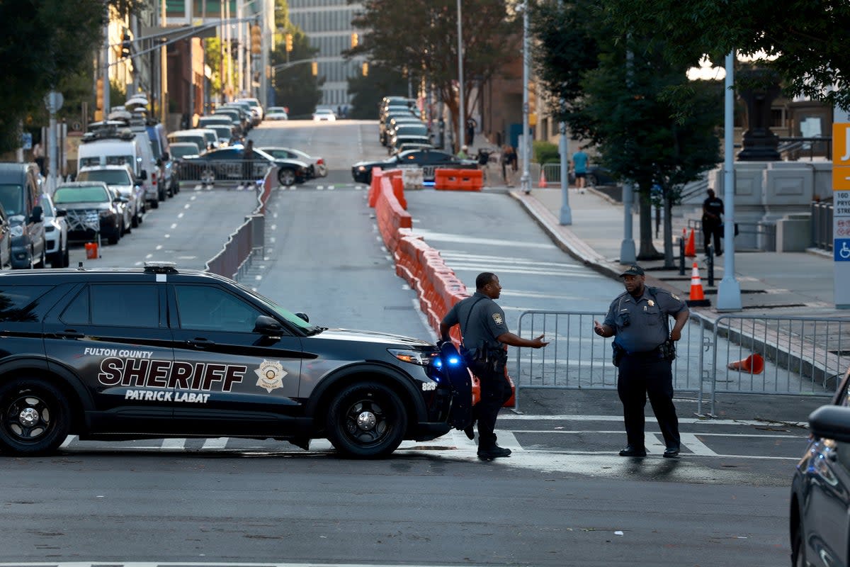 Fulton County Sheriff officers block off a street in front of the Fulton County Courthouse on August 07, 2023 in Atlanta, Georgia (Getty Images)