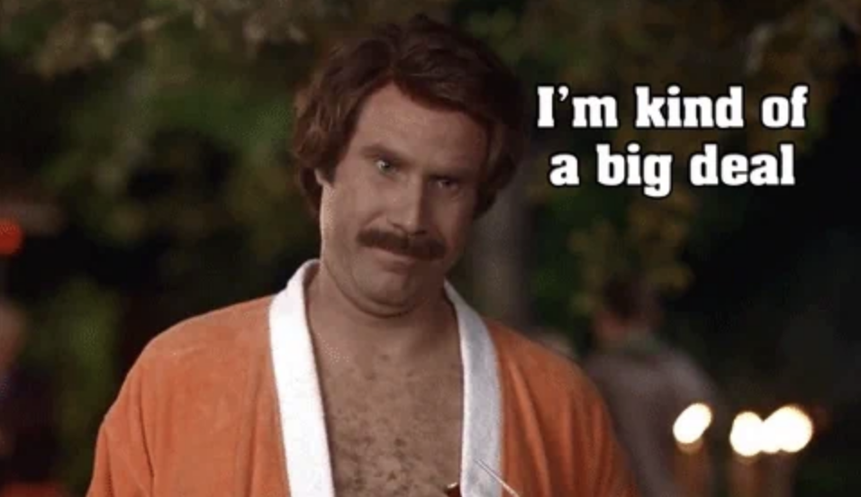 Will Ferrell, dressed as Ron Burgundy in a robe, with text saying "I'm kind of a big deal" in the background