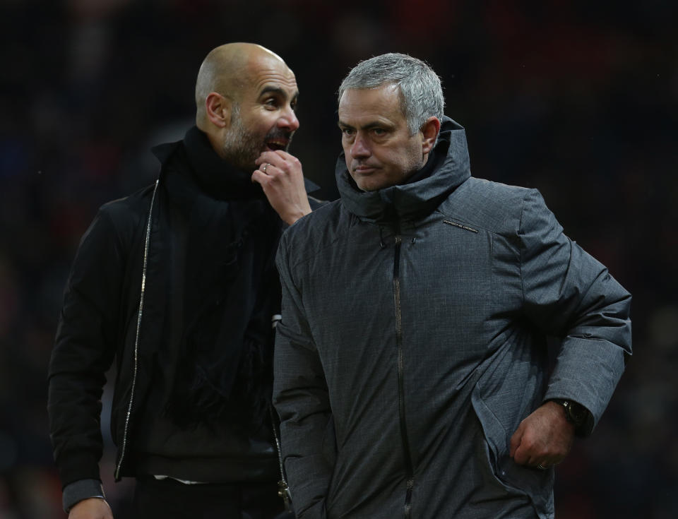 Jose Mourinho and Pep Guardiola on the Old Trafford sideline during Manchester City’s 2-1 victory over Manchester United. (Getty)