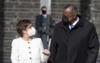 Annegret Kramp-Karrenbauer, Federal Minister of Defence, receives US Secretary of Defence Lloyd Austin at the Federal Ministry of Defence in Berlin, Germany, Tuesday, April 13, 2021. This is the first visit to Germany by a minister of the new US administration. Austin will then travel on to Stuttgart, where he will talk to soldiers at the US command centres for troops in Africa and Europe. (Kay Nietfeld/dpa via AP)