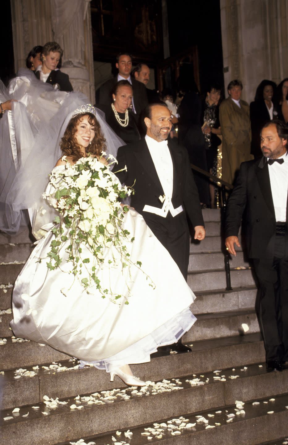 1993: Mariah Carey struts down the steps after her first wedding