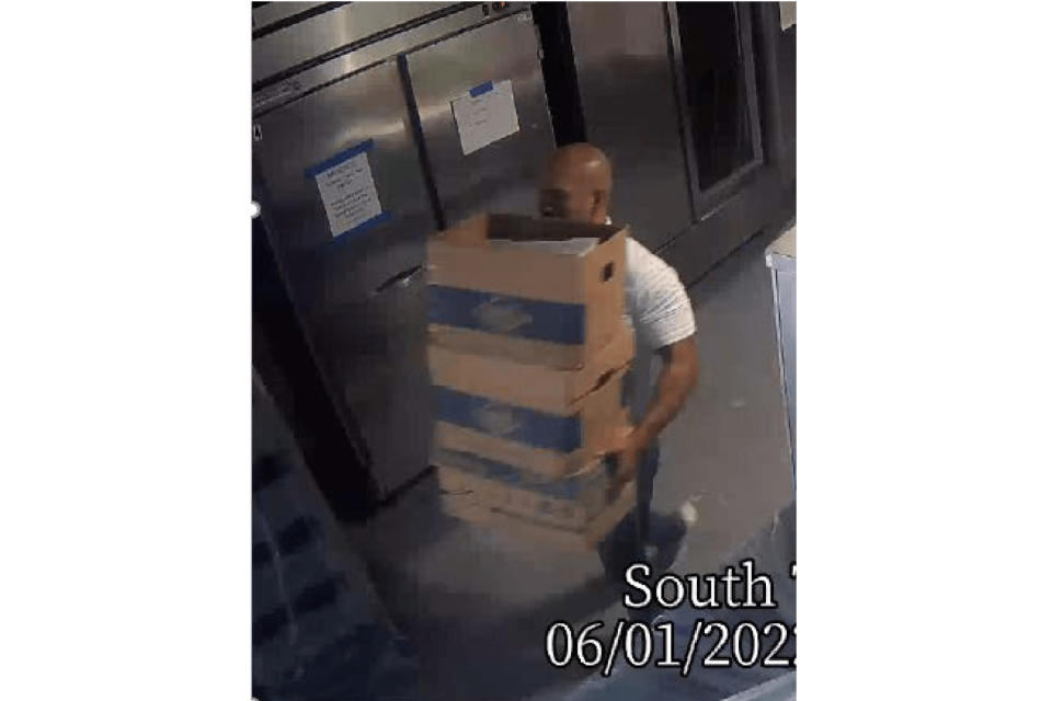 This image from video obtained by the Justice Department and included as part of an exhibit in a motion filed by the defense team to suppress boxes of records seized at Mar-a-Lago, shows Walt Nauta, personal aide to former President Donald Trump, carrying boxes at the Palm Beach, Fla., estate. (Justice Department via AP)