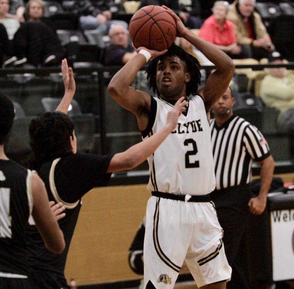 Clyde's Garis Gray shoots a 3-pointer.