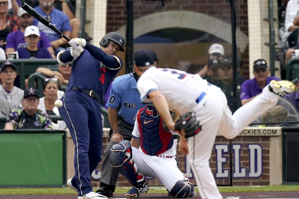 American League's Shohei Ohtani, of the Los Angeles Angeles, grounds out on a pitch by National League's starting pitcher Max Scherzer, of the Washington Nationals, during the first inning of the MLB All-Star baseball game, Tuesday, July 13, 2021, in Denver. (AP Photo/Gabriel Christus)