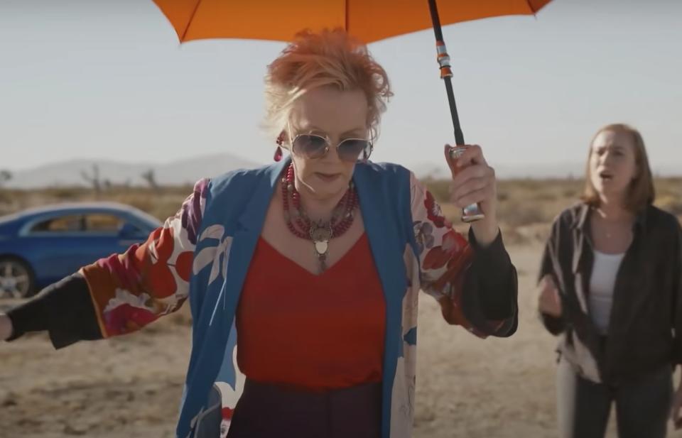 Jean Smart walking through the desert in Hacks