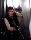 <b>Change is Good</b><br>Lucas's first draft introduced not only the young hero who would become Luke Skywalker, but also the intergalactic smuggler, Han Solo, and his sidekick, Chewbacca. However, in this early iteration, Han was imagined as a "<a href="http://www.enotes.com/topic/Star_Wars_Episode_IV:_A_New_Hope#cite_note-15" rel="nofollow noopener" target="_blank" data-ylk="slk:green-skinned monster with gills;elm:context_link;itc:0;sec:content-canvas" class="link ">green-skinned monster with gills</a>."