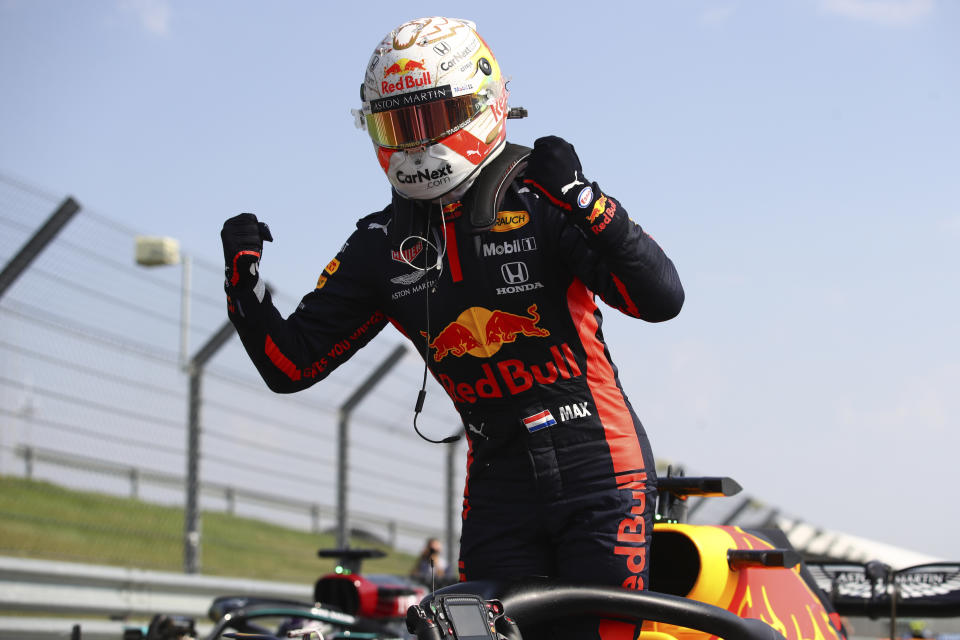 Red Bull driver Max Verstappen of the Netherlands celebrates after winning the 70th Anniversary Formula One Grand Prix at the Silverstone circuit, Silverstone, England, Sunday, Aug. 9, 2020. (Bryn Lennon, Pool via AP)