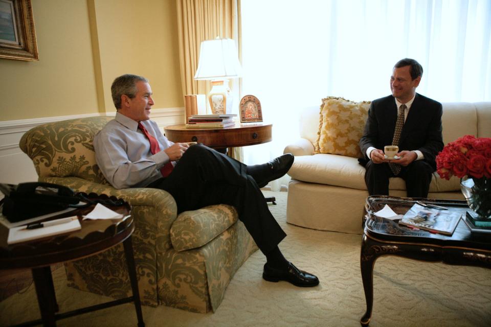 President Bush and Judge John G. Roberts enjoy an early morning coffee at the residence in the White House Wednesday, July 20, 2005.