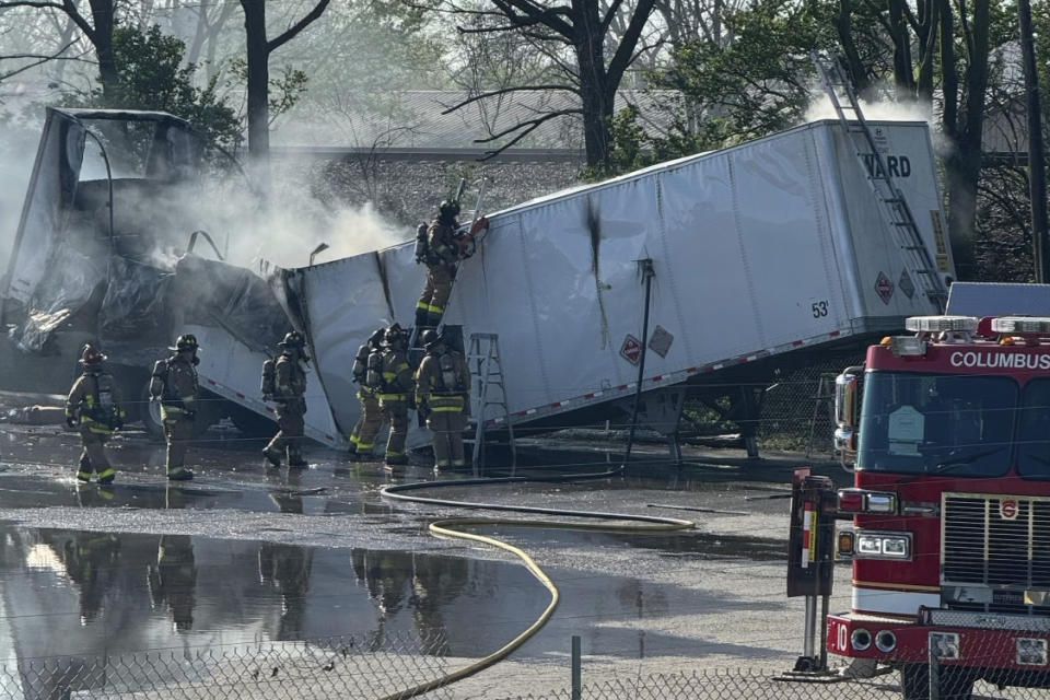 This photo released by the Columbus Fire Department shows firefighters tending to a fire that began on a trailer carrying lithium batteries in Columbus, Ohio on Thursday, April 18, 2024. (Columbus Fire Department via AP)