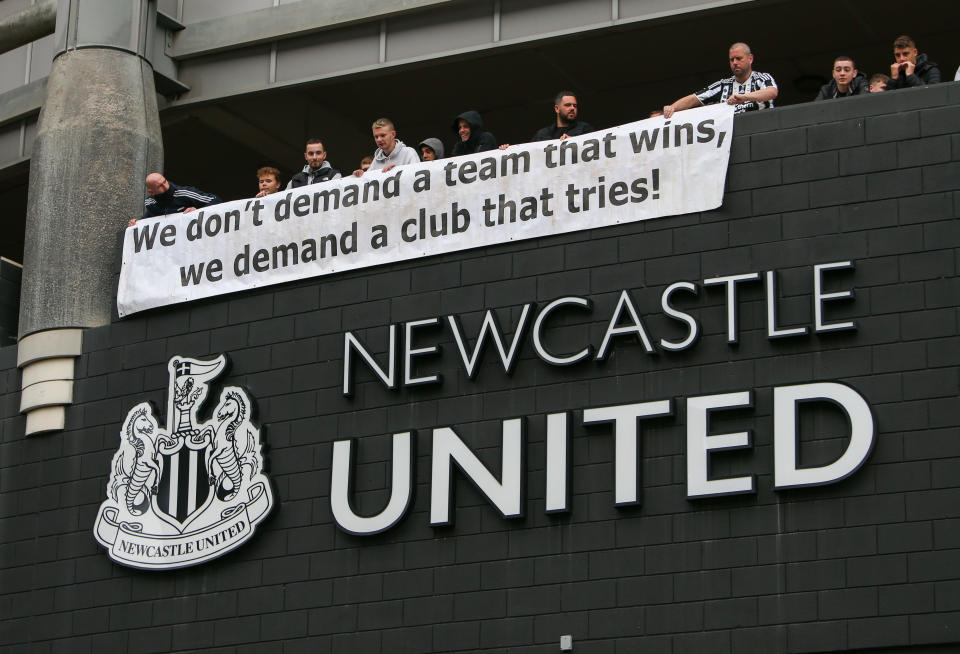 Newcastle United fans (pictured) hold up a protest banner ahead of the proposed takeover Scenes at St. James's Park.