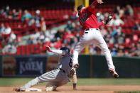 Detroit Tigers' Robbie Grossman (8) steals second base ahead of the throw to Boston Red Sox's Marwin Gonzalez (12) during the sixth inning of a baseball game, Thursday, May 6, 2021, in Boston. (AP Photo/Michael Dwyer)