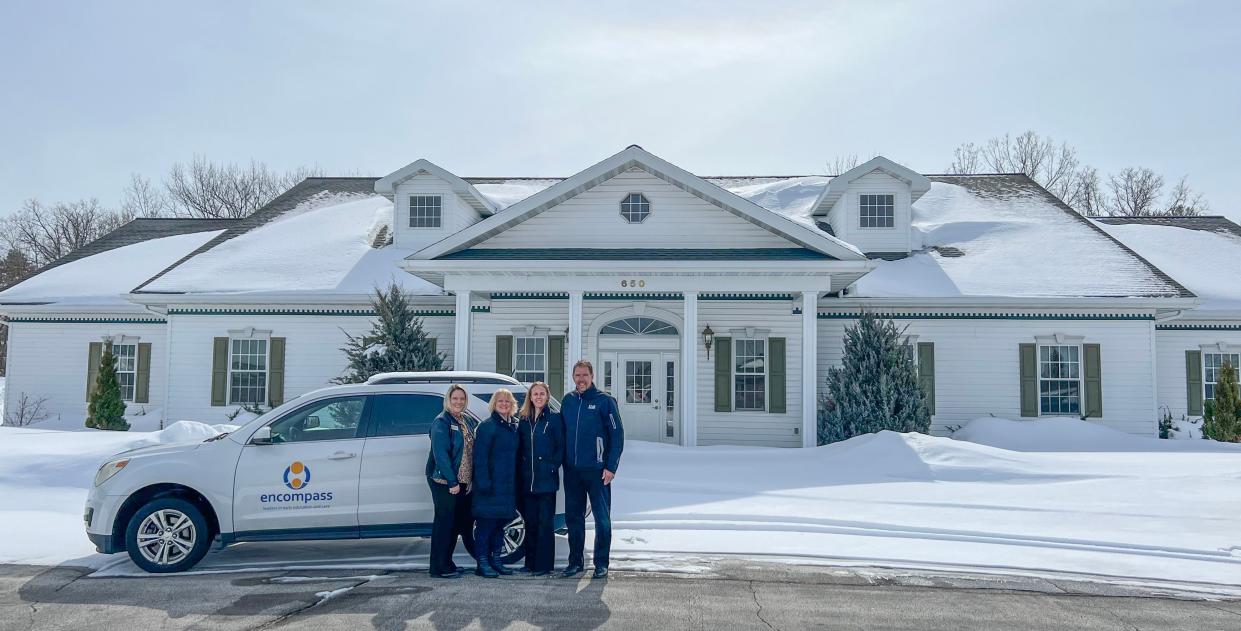 From left, Encompass Director Missy Schmeling, Health Officer for Oconto County Debbie Konitzer, Oconto County Economic Development Corp. Executive Director Jayme Sellen and Oconto County Health and Human Services Director Scott Shakelford stand outside the property that will soon become Encompass' Oconto Falls location.