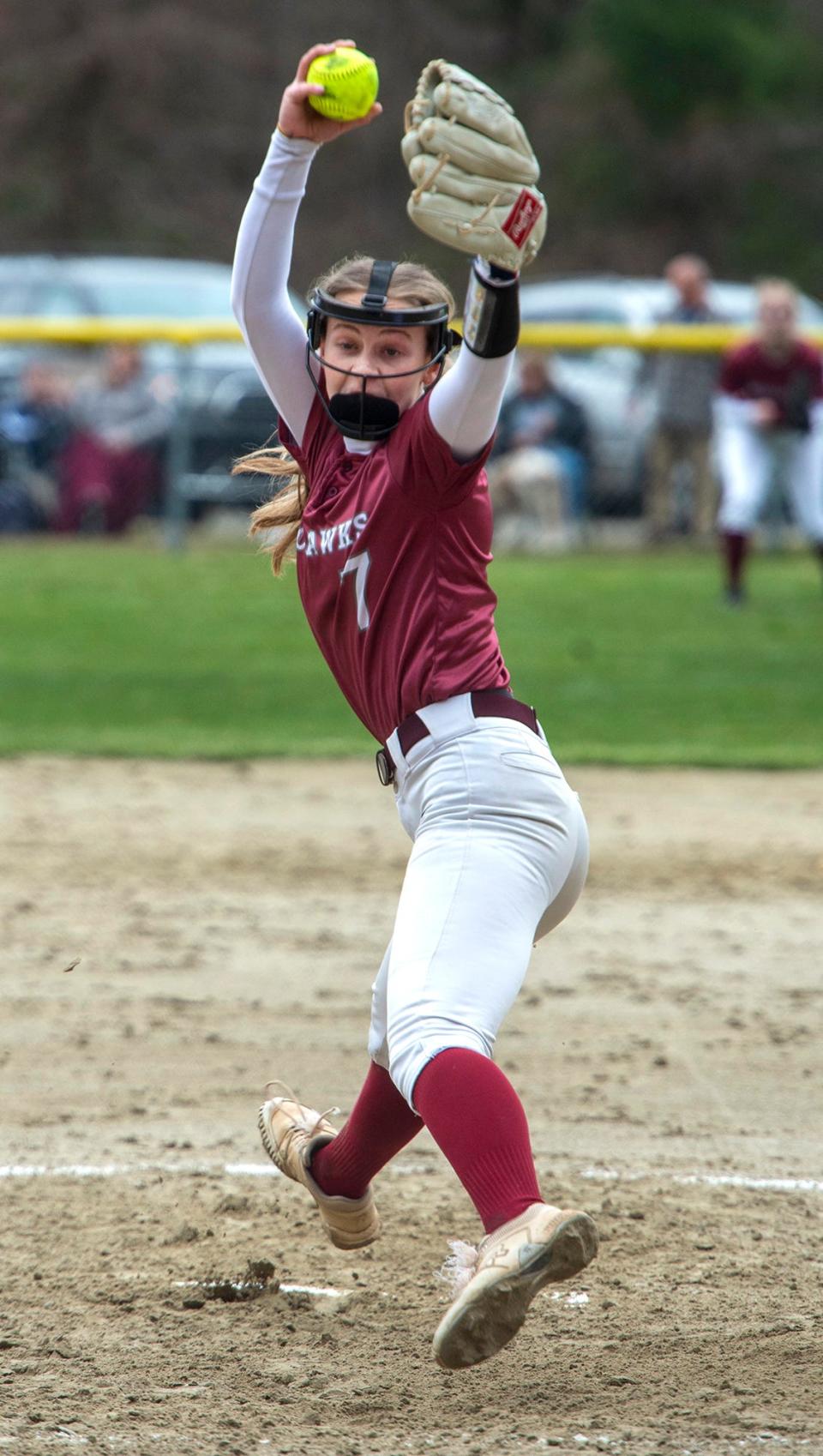 Millis High School's Riley Caufield pitching against Millis, April 10, 2024. She reached 500 strikeouts in her previous outing.