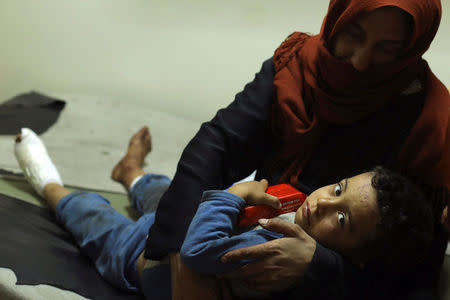 A wounded boy receives treatment inside a hospital in Hasaka province, Syria, October 13, 2017. REUTERS/Rodi Said