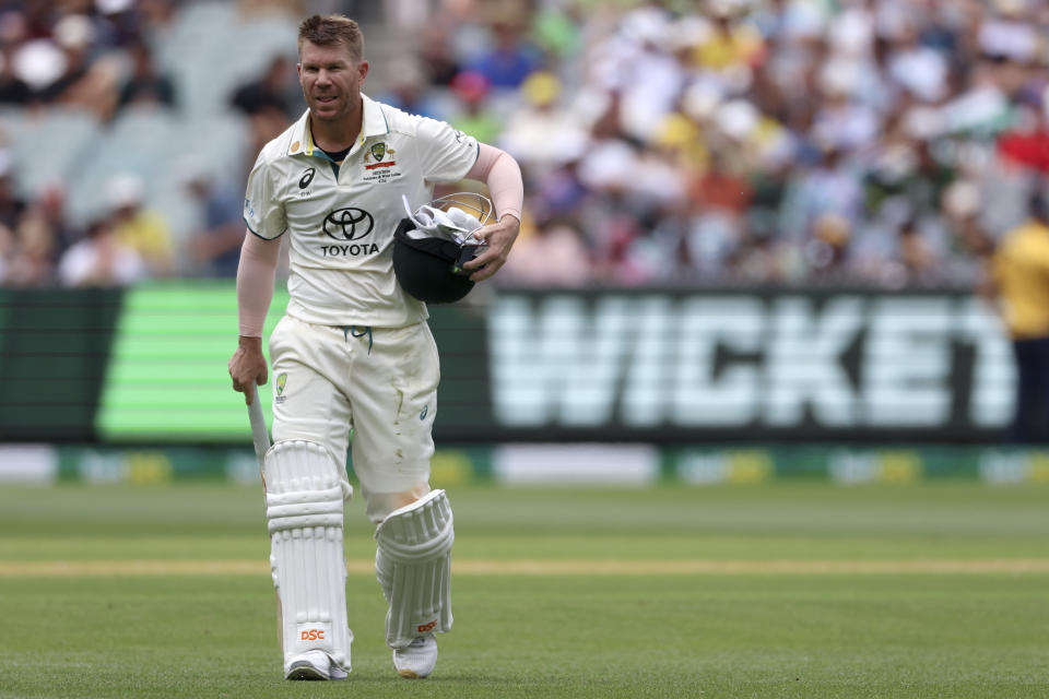 Australia's David Warner walks off after he was caught out for 38 runs against Pakistan during their cricket test match in Melbourne, Tuesday, Dec. 26, 2023. (AP Photo/Asanka Brendon Ratnayake)