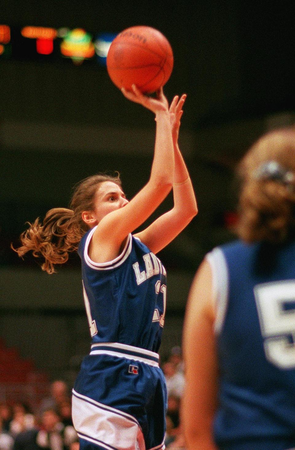 Highlands High School's Jaime Walz breaks the Kentucky high school girls scoring record Friday, Jan. 19, 1996, at UC's Shoemaker Center.