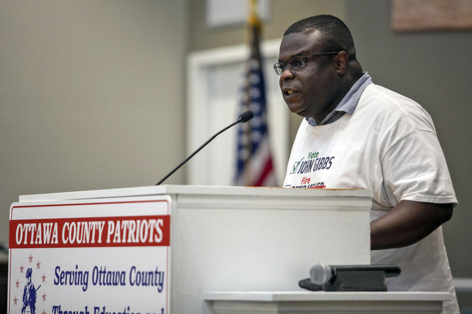 FILE - John Gibbs, who is running against Rep. Peter Meijer, R-Mich., in the Aug. 2, primary election, speaks during a Republican candidate Forum and pre-election rally at the Lighthouse Baptist Church in Holland, Mich., on July 19, 2022. (Daniel Shular/The Grand Rapids Press via AP, File)