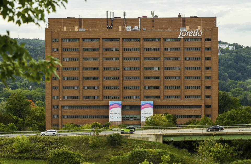 This Tuesday, Sept. 21, 2021 photo shows the Loretto Health and Rehabilitation in Syracuse, N.Y. Natalie Walters' father, Jack, died of COVID-19 at Loretto. The facility's staffing has declined during the pandemic and Walters wonders if poor staffing played a role in her father's infection or death. Nationwide, one-third of U.S. nursing homes have fewer nurses and aides than before COVID-19 began ravaging their facilities, an Associated Press analysis of federal data finds. (AP Photo/Heather Ainsworth)