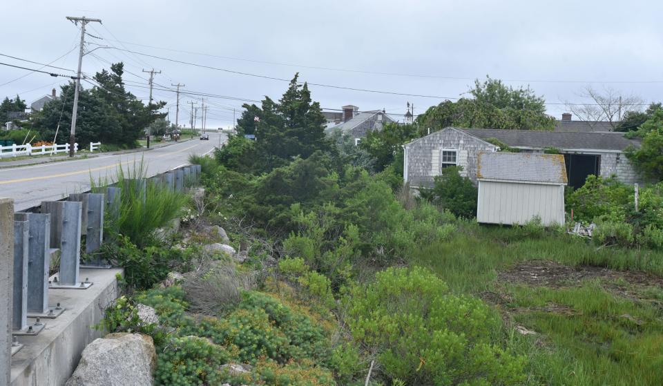 This July 2023 file photo shows the view looking south from the Centerville River Bridge towards Craigville Beach. Property at 2 Short Beach Road is seen at right.