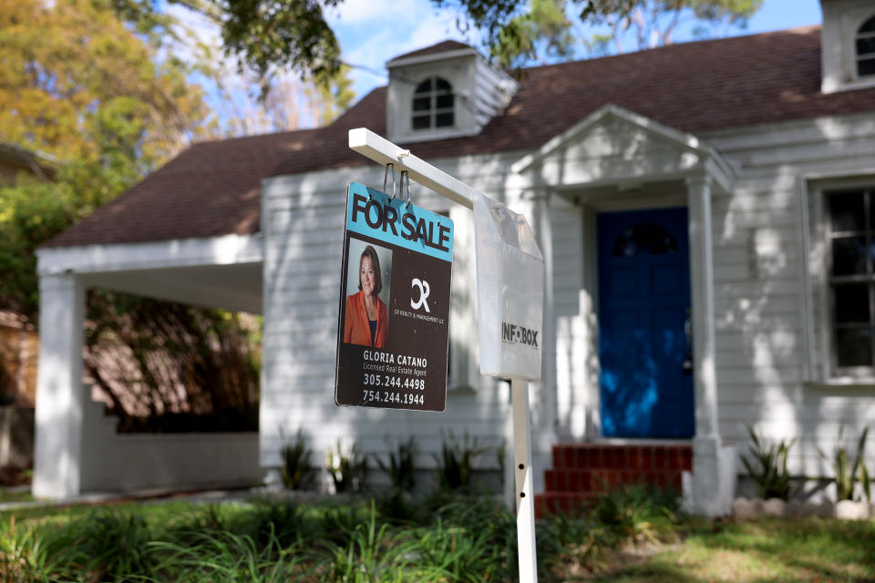 MIAMI, FLORIDA - FEBRUARY 22: A For Sale sign displayed in front of a home on February 22, 2023 in Miami, Florida. US home sales declined in January for the 12th consecutive month as high mortgage rates along with high prices kept people shopping for homes out of the market. It was the weakest home sales activity since 2010. (Photo by Joe Raedle/Getty Images)