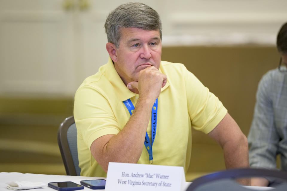 FILE - West Virginia Secretary of State Andrew "Mac" Warner attends the summer conference of the National Association of Secretaries of State in Baton Rouge, La., July 8, 2022. The Republican secretaries of state in Ohio, West Virginia and Missouri all have promoted their states’ elections as fair and secure. Yet each also is navigating a fine line on how to address election fraud conspiracies, as they eye campaigns for U.S. Senate or governor in 2024. (AP Photo/Matthew Hinton, File)