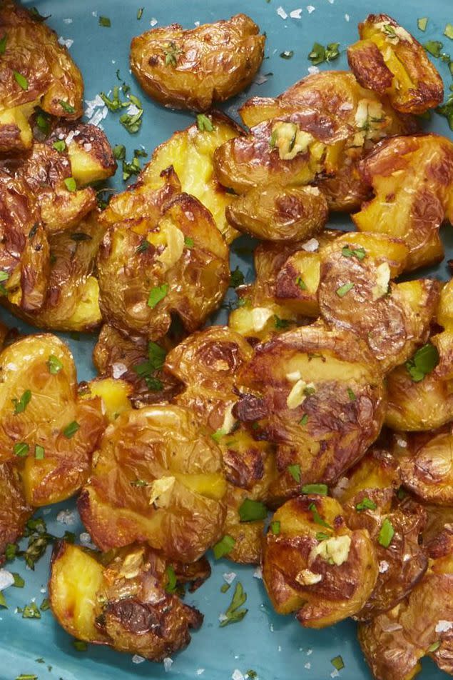 <p>Smashing your roasted potatoes gives you crispy edges and perfectly cooked insides. You won't regret giving it a try.</p><p><a href="https://www.womansday.com/food-recipes/food-drinks/a25362713/crispy-smashed-potatoes-with-fresh-herbs-recipe/" rel="nofollow noopener" target="_blank" data-ylk="slk:Get the Crispy Smashed Potatoes with Fresh Herbs recipe.;elm:context_link;itc:0;sec:content-canvas" class="link "><em><strong>Get the Crispy Smashed Potatoes with Fresh Herbs recipe.</strong></em></a></p><p><strong><strong>What You'll Need: </strong></strong><a href="https://www.amazon.com/New-Star-Foodservice-36831-Commercial/dp/B009LA107W/?tag=syn-yahoo-20&ascsubtag=%5Bartid%7C10070.g.2055%5Bsrc%7Cyahoo-us" rel="nofollow noopener" target="_blank" data-ylk="slk:Baking sheet;elm:context_link;itc:0;sec:content-canvas" class="link ">Baking sheet</a> ($10, Amazon)<br></p>