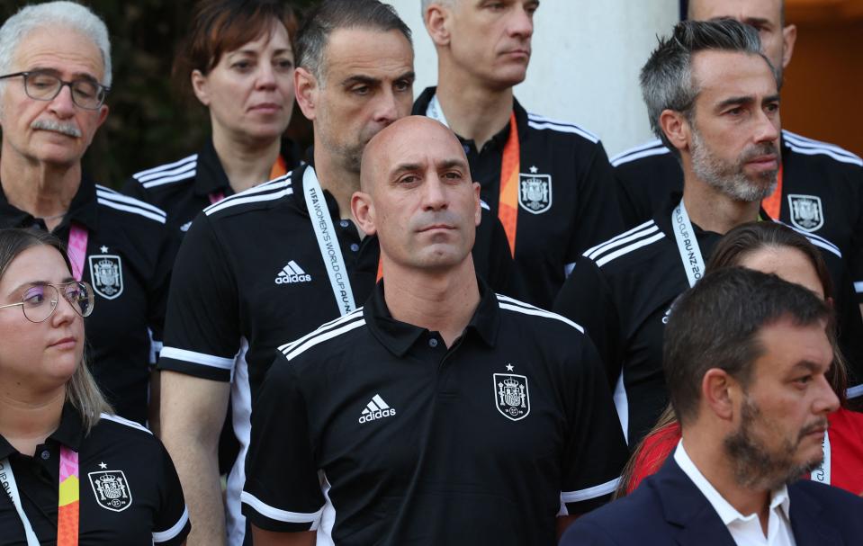 Spanish Royal Football Federation (RFEF) president Luis Rubiales, center, and Spain's coach Jorge Vilda, upper right, attend an August 22 World Cup victory celebration in Madrid.