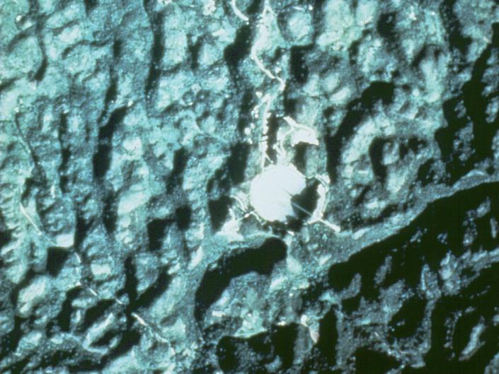 high altitude picture of the Arecibo Observatory