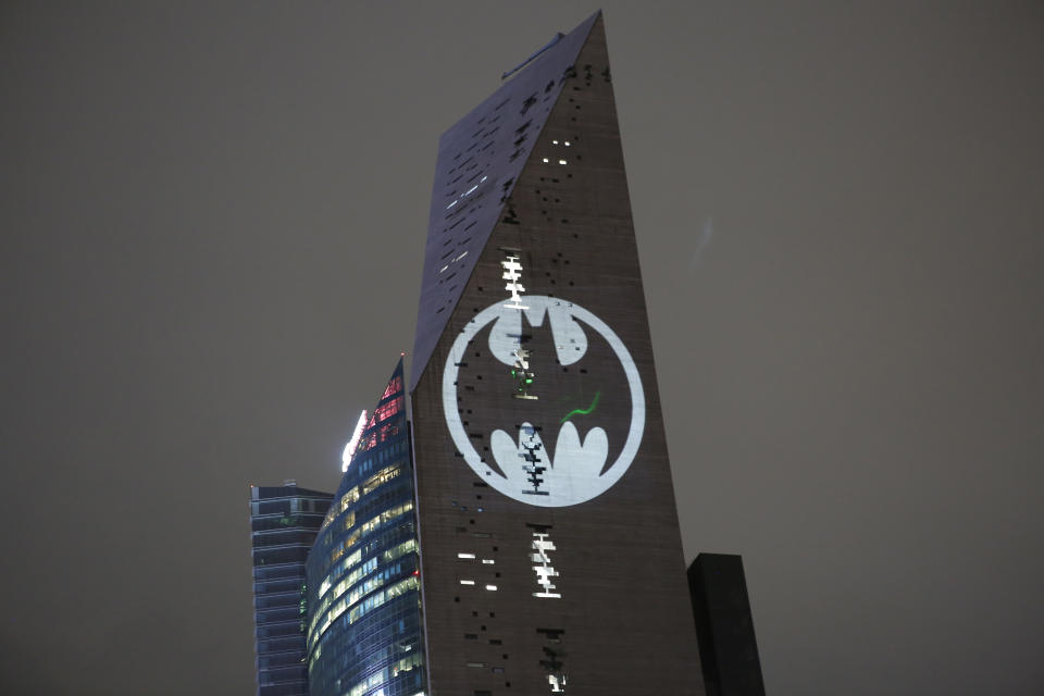 A Bat signal is lit in the Torre Reforma during the commemorating of Batman's 80th anniversary in Mexico City, Saturday, Sept. 21, 2019. (AP Photo/Ginnette Riquelme)