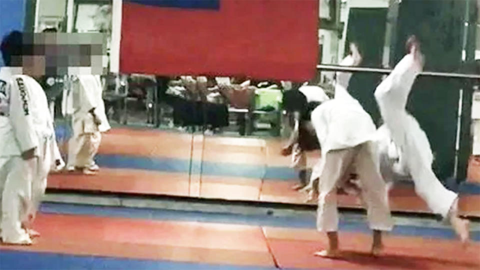 The seven-year-old boy, pictured here during the fateful judo class.