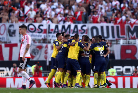 Football Soccer - Argentine First Division - River Plate v Boca Juniors - Antonio Liberti Stadium, Buenos Aires, Argentina - 11/12/2016 - Boca Juniors' players celebrate at the end of the match. REUTERS/Marcos Brindicci