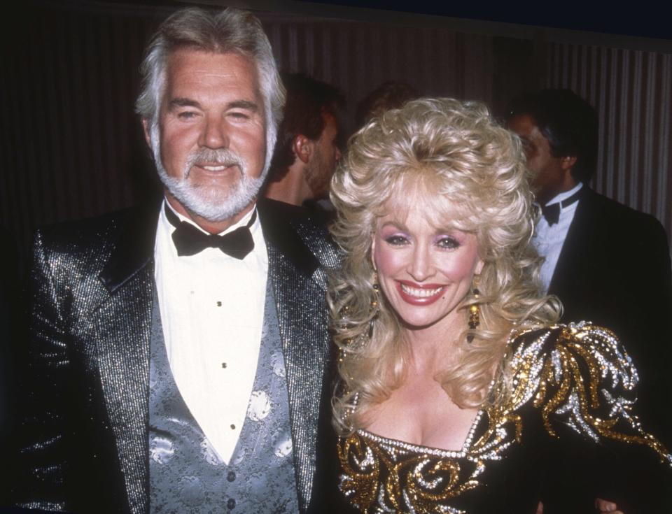 Country music legend Kenny Rogers, who sold more than 100 million records in a career that spanned decades and seen here with his frequent duet partner Dolly Parton, died on March 20, 2020 at 81.