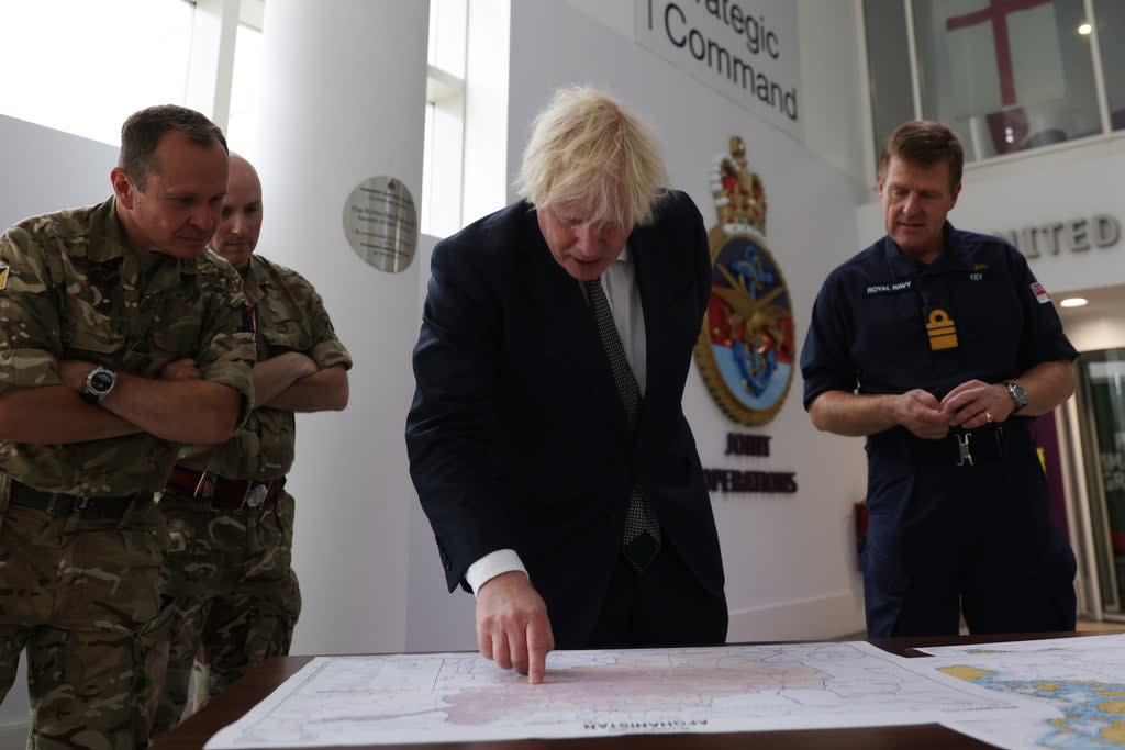 Prime Minister Boris Johnson with Vice Admiral Ben Key (right) during a visit to the British Armed Forces Permanent Joint Headquarters (PA Wire)