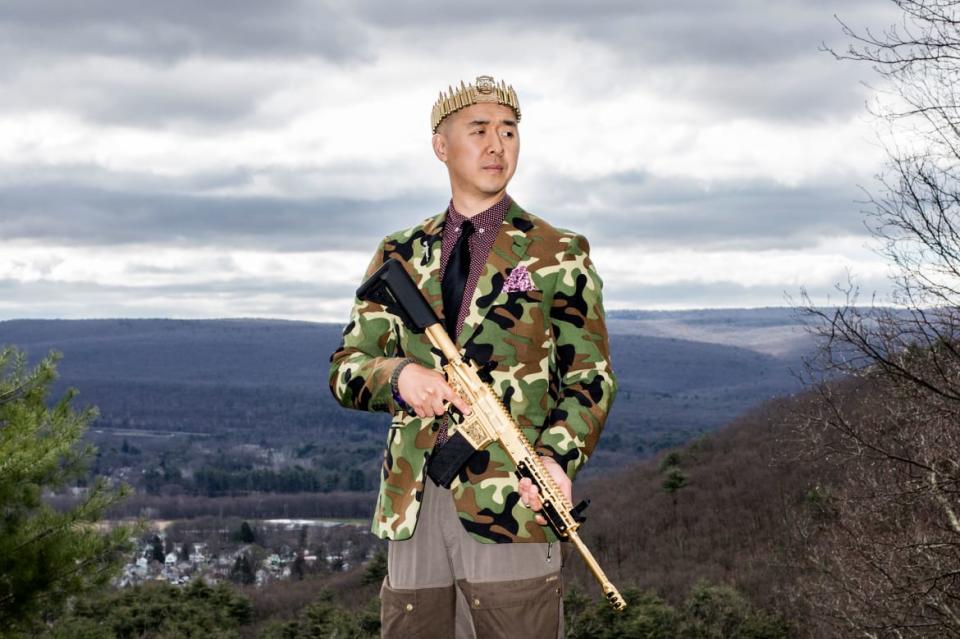 <div class="inline-image__caption"><p>Reverend Hyung Jin "Sean" Moon poses for a portrait with his gold AR-15 "rod of iron" at Moon's home in Matamoras, Penn., on Thursday, April 26, 2018.</p></div> <div class="inline-image__credit">Bryan Anselm/Redux For The Washington Post via Getty</div>