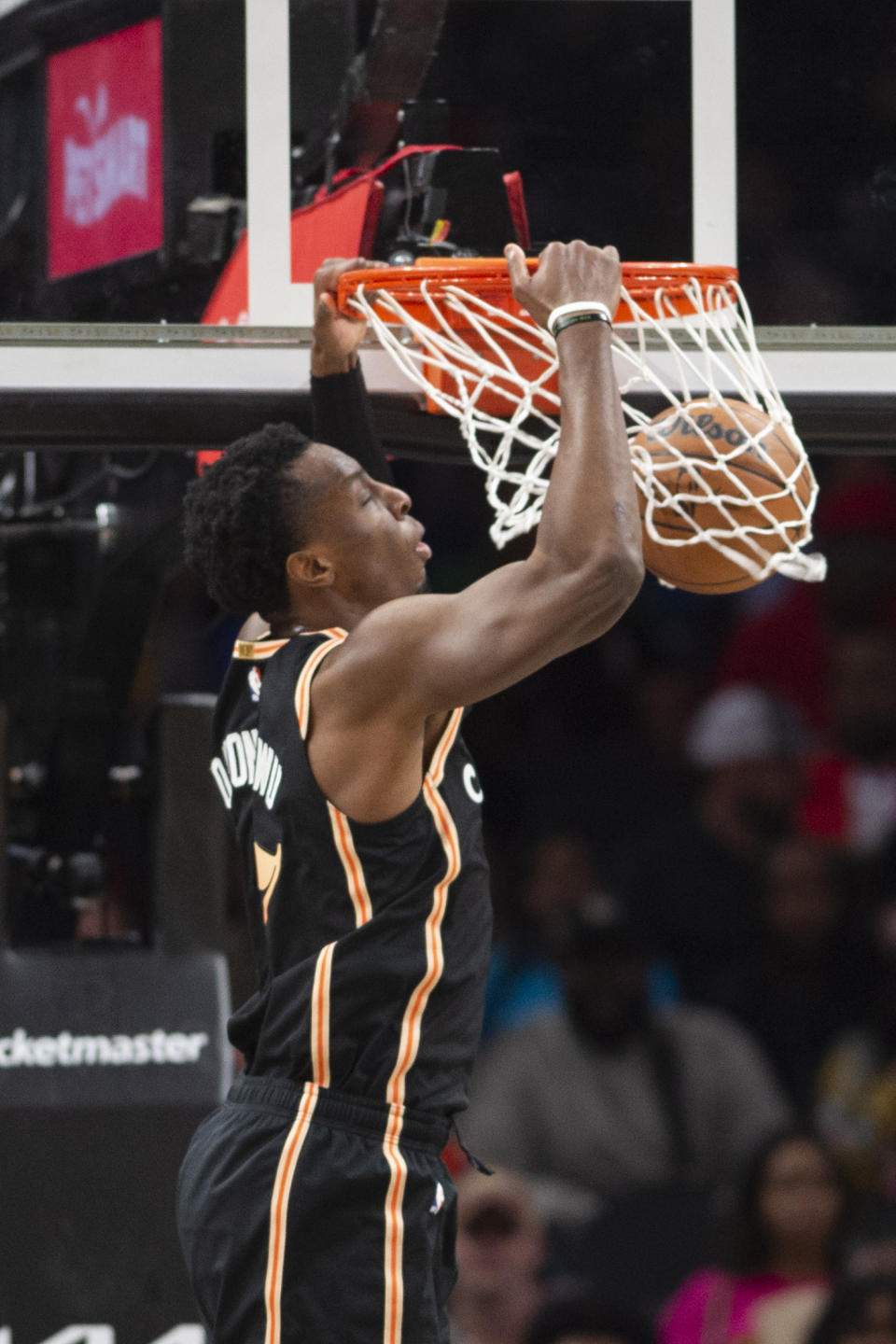 Atlanta Hawks forward Onyeka Okongwu dunks during the second half of an NBA basketball game against the Golden State Warriors, Friday, March 17, 2023, in Atlanta. (AP Photo/Hakim Wright Sr.)