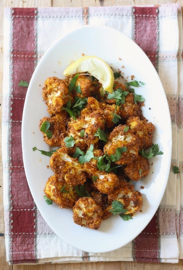 <strong>Get the <a href="http://blog.seasonwithspice.com/2013/11/tandoori-roasted-cauliflower-recipe.html" target="_blank">Tandoori-Roasted Cauliflower with Almond Butter recipe</a> from Season With Spice</strong>