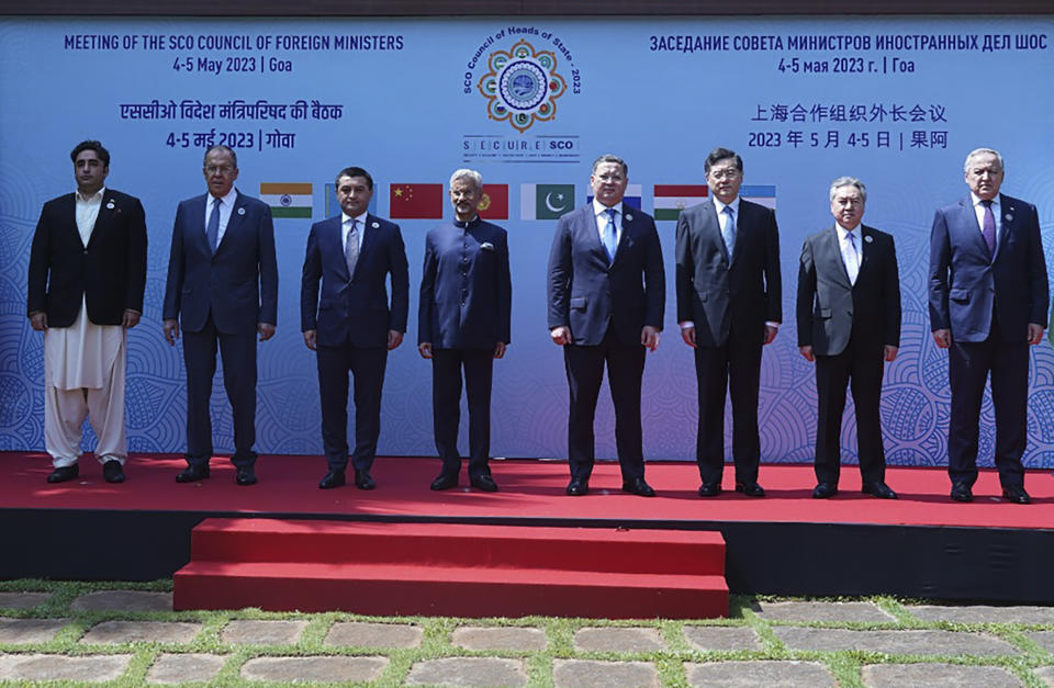 This photo released by Indian Foreign Ministry, shows from left, Pakistani Foreign Minister Bilawal Bhutto Zardari, Russian Foreign Minister Sergey Lavrov, Uzbekistani Foreign Minister Bakhtiyor Saidov, Indian Foreign Minister S. Jaishankar, Kazakhstan's Foreign Minister Murat Nurtleu, Chinese Foreign Minister Qin Gang, Kyrgyzstan's Foreign Minister Jeenbek Kulubaev, and Tajikistan's Foreign Minister Sirodjidin Aslov, pose for a group photograph prior to the Shanghai Cooperation Organization (SCO) council of foreign ministers' meeting, in Goa, India, Friday, May 5, 2023. (Indian Foreign Ministry via AP )