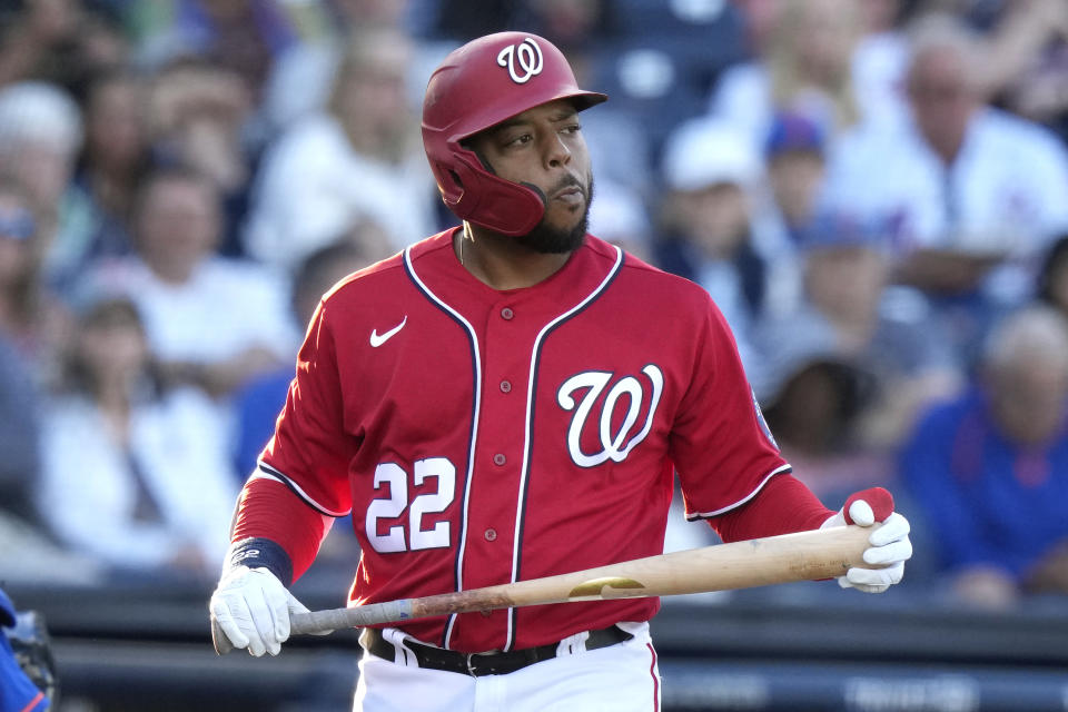 Washington Nationals' Dominic Smith reacts after striking out during the third inning of the team's spring training baseball game against the New York Mets, Thursday, March 16, 2023, in West Palm Beach, Fla. (AP Photo/Lynne Sladky)