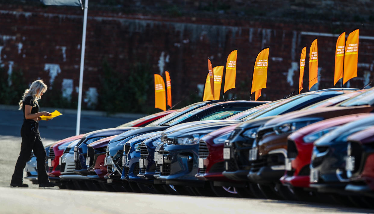 Cars on display at a dealership. (Getty)