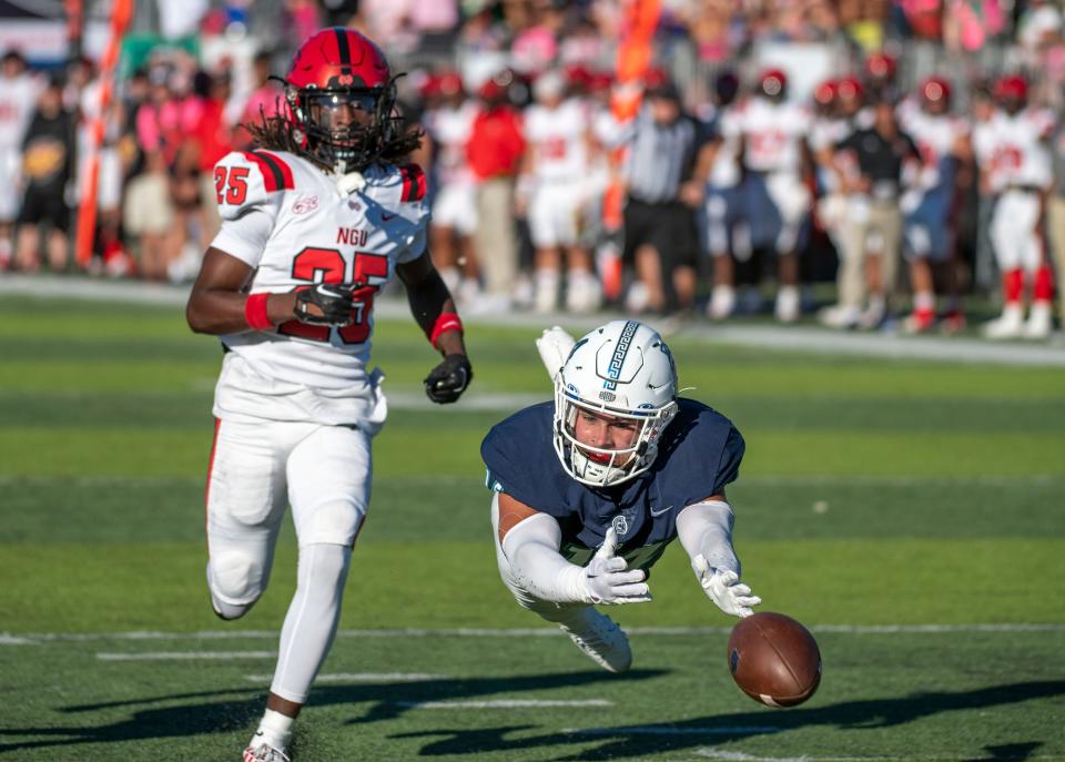 West Florida's Caden Leggett just misses the catch as they take on North Greenville at Pen Air Field at the University of West Florida Saturday,, October 1, 2022.